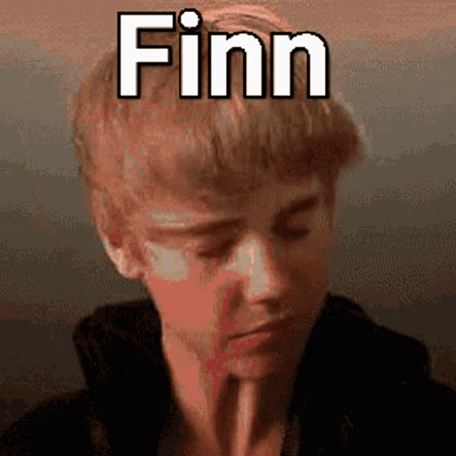 a young man with a straw in his mouth and the name finn above his head
