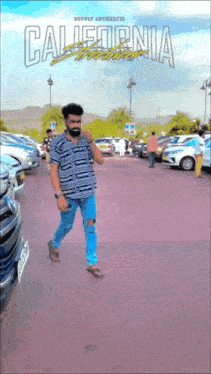 a man walking in a parking lot with california written on the bottom