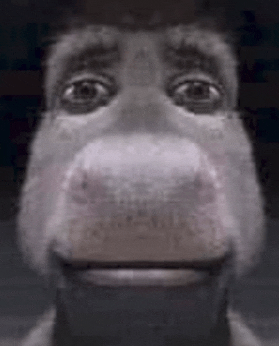 a close up of a cartoon character 's face with a smile on it .