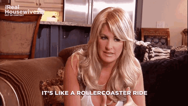 a woman sitting on a couch with the words " it 's like a rollercoaster ride " below her