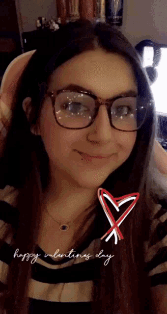 a girl wearing glasses and a necklace with the words happy valentines day