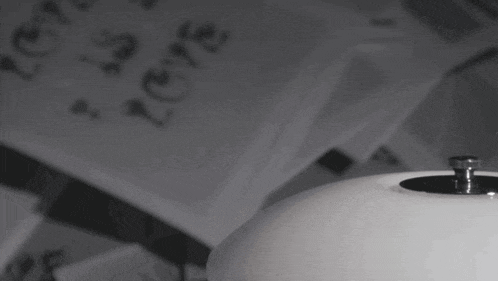 a black and white photo of a table with the words love written on it