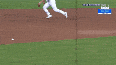 a baseball player throws a ball in front of a sign that says ' busa '