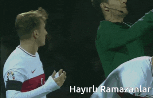 a soccer player with the word hayirli ramazanlar on the bottom right