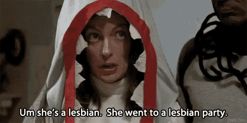 a woman in a shark costume says she 's a lesbian . she went to a lesbian party .
