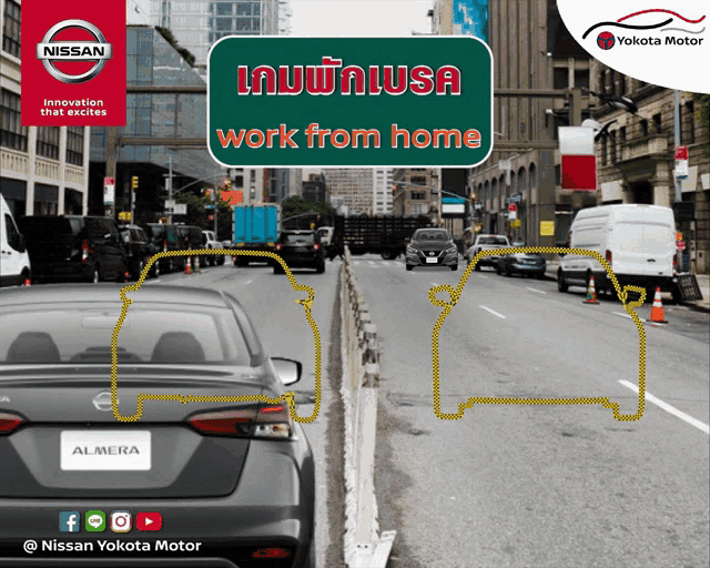 a nissan almera is driving down a busy street