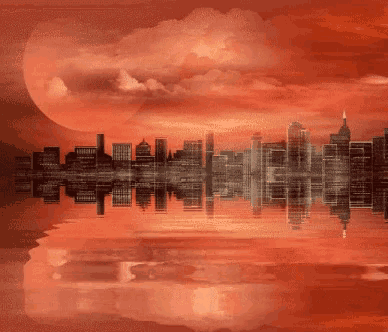 a city skyline is reflected in the water with a red sky in the background