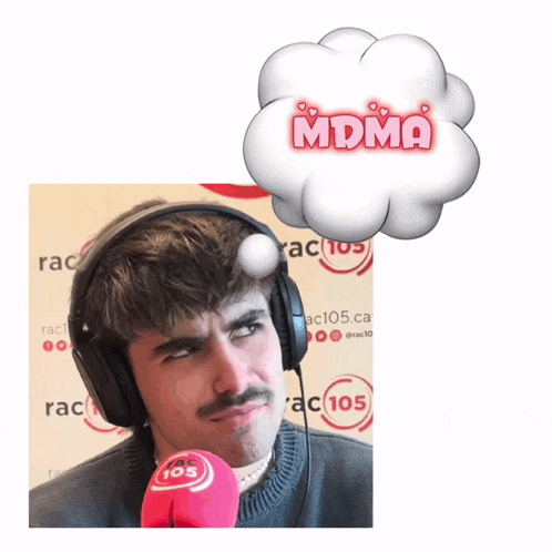 a man wearing headphones and holding a microphone with the word mdma above his head