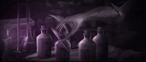 a person is pouring liquid into a bottle with the letter o on it .