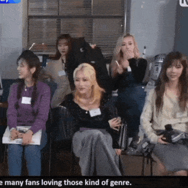 a group of girls are sitting in a room with the words many fans loving those kind of genre