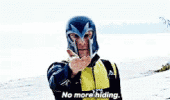 a man in a superhero costume is pointing at the camera and says no more hiding .