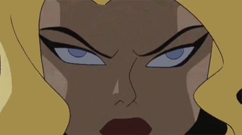 a close up of a cartoon character 's face with a very angry expression .