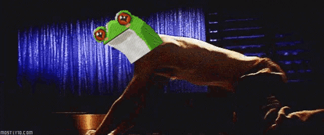 a man with a frog on his head and the word bonk in the corner
