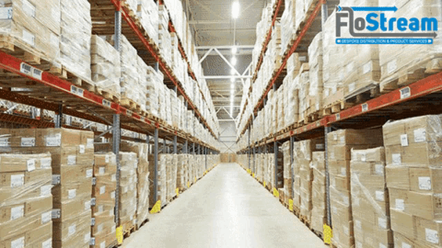 a warehouse filled with lots of boxes and a flostream logo in the background
