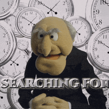 a puppet is surrounded by clocks and says " searching for " on the bottom