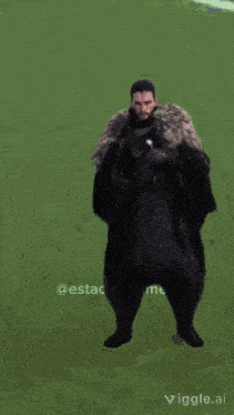 a close up of a man with a beard and a fur coat .