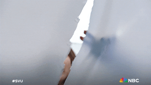 a nbc ad shows a man looking at a piece of paper