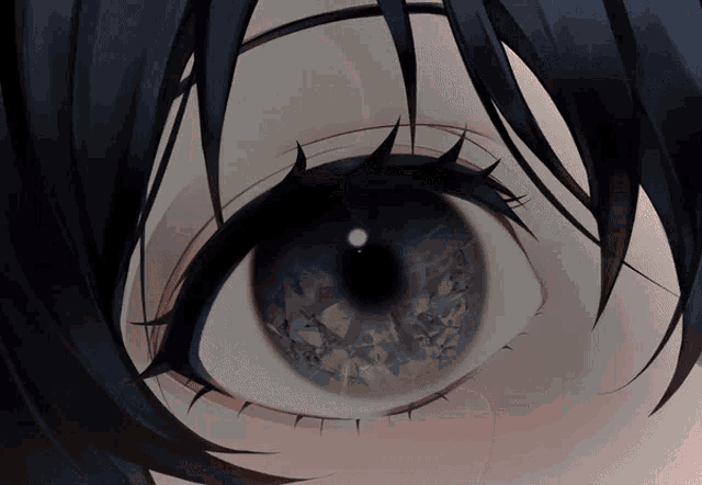 a close up of a person 's eye with a black background