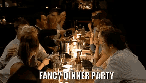 a group of people sitting at a long table with the words fancy dinner party written below them