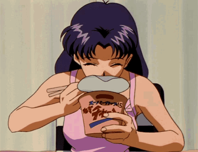a girl is eating from a cup that says 15
