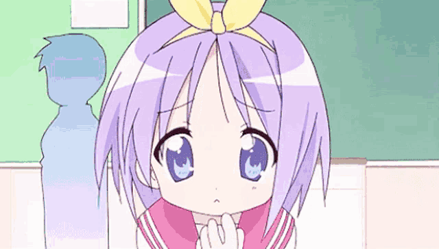 a cartoon girl with purple hair and blue eyes is sitting in front of a green board .