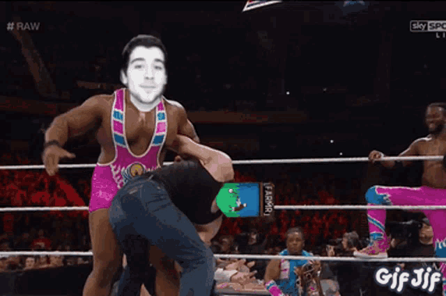 a gif of a wrestler being lifted by another wrestler