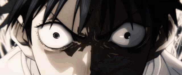 a close up of a person 's face with a very angry look on their face