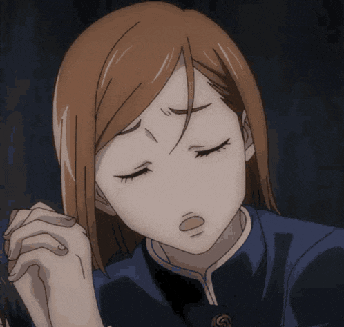 a close up of a person with their eyes closed