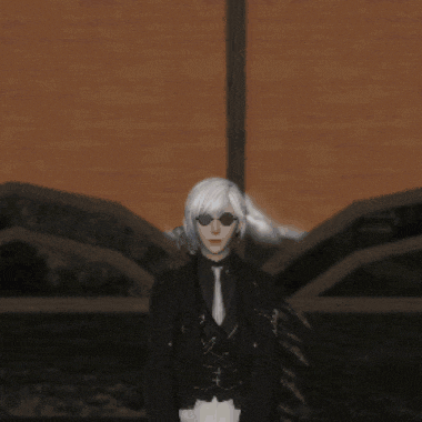 a woman with white hair is wearing sunglasses and a black jacket
