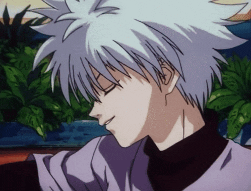 a close up of a person with white hair