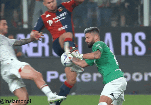 a soccer player in a green jersey kicks a ball