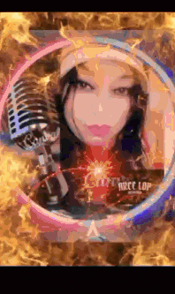 a woman is holding a microphone in front of a circle of flames .