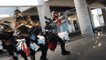 a group of superheros are fighting in a parking lot