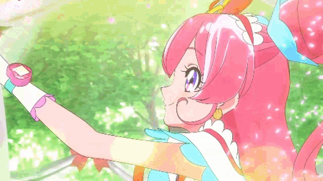 a girl with pink hair and a watch on her wrist holds a wand