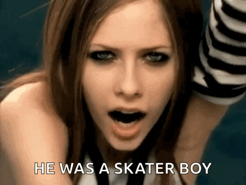 a close up of a woman 's face with the words he was a skater boy below her