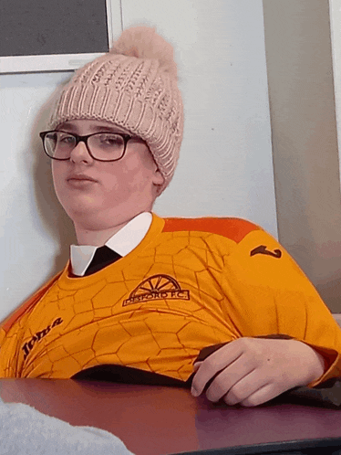a person wearing a jersey that says athletic club