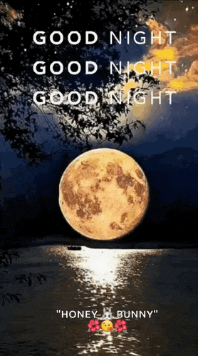 a picture of a full moon over a body of water