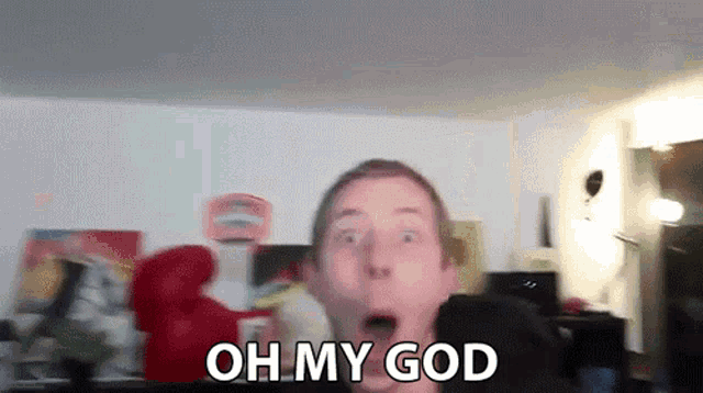 a man with a surprised look on his face says " oh my god "