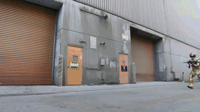 a sign on the side of a building warns of a danger zone