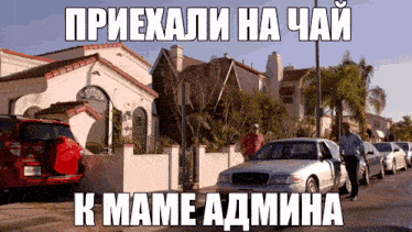 a toyota suv is parked in front of a house with a sign that says " k mame admina "