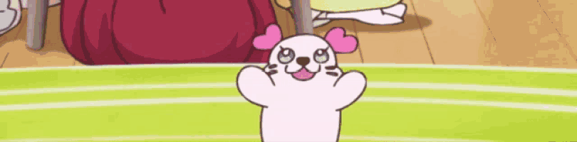 a cartoon drawing of a seal with hearts on its face
