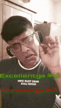 a man wearing glasses and headphones says excellentga good luck