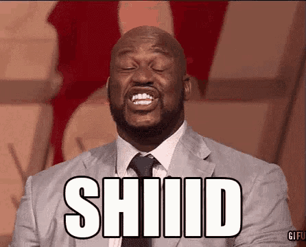 a man in a suit and tie is making a funny face and the word shiid is on his face