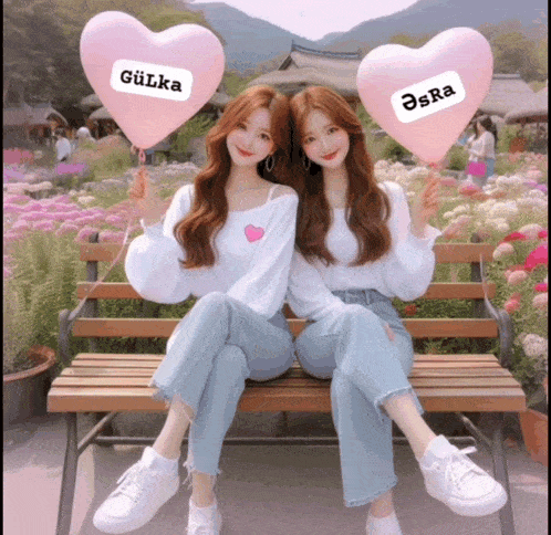 two girls are sitting on a bench holding pink heart shaped balloons with the names gülka and asra on them