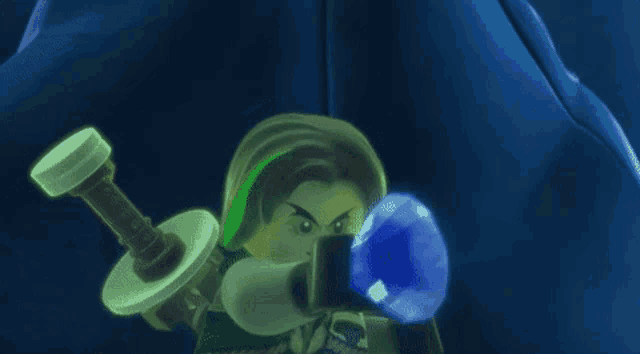 a lego character is holding a blue jewel and a sword