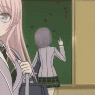 a girl with pink hair is standing in front of a blackboard in a classroom .