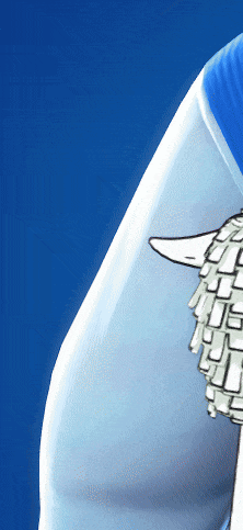 a close up of a person 's arm against a blue backdrop