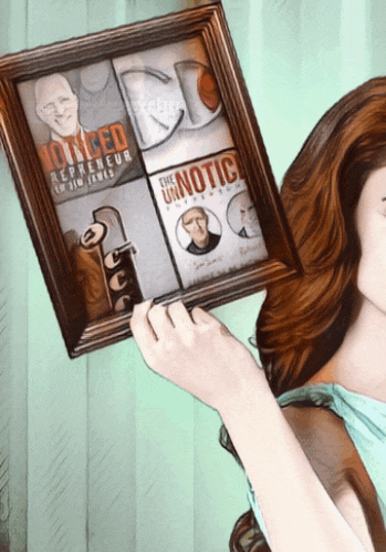 a woman is holding a framed picture that says " the unnoticed "