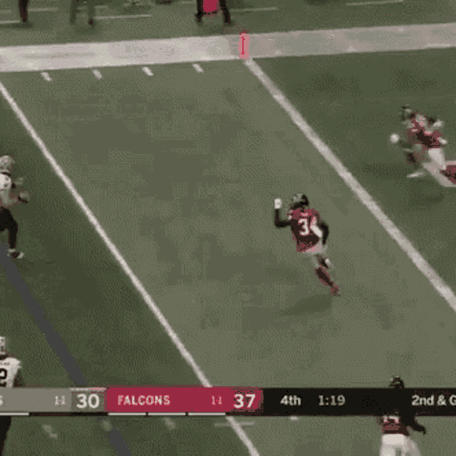 a football game is being played between the falcons and the jets