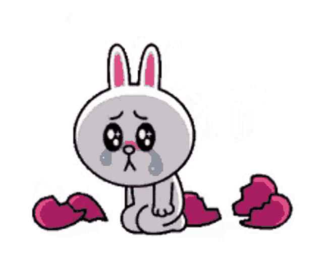 a cartoon rabbit is crying and surrounded by broken hearts